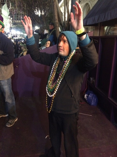 Mardi Gras David waiting for beads